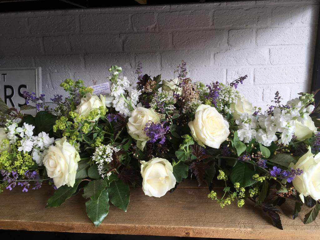 Cream table piece with hints of purple